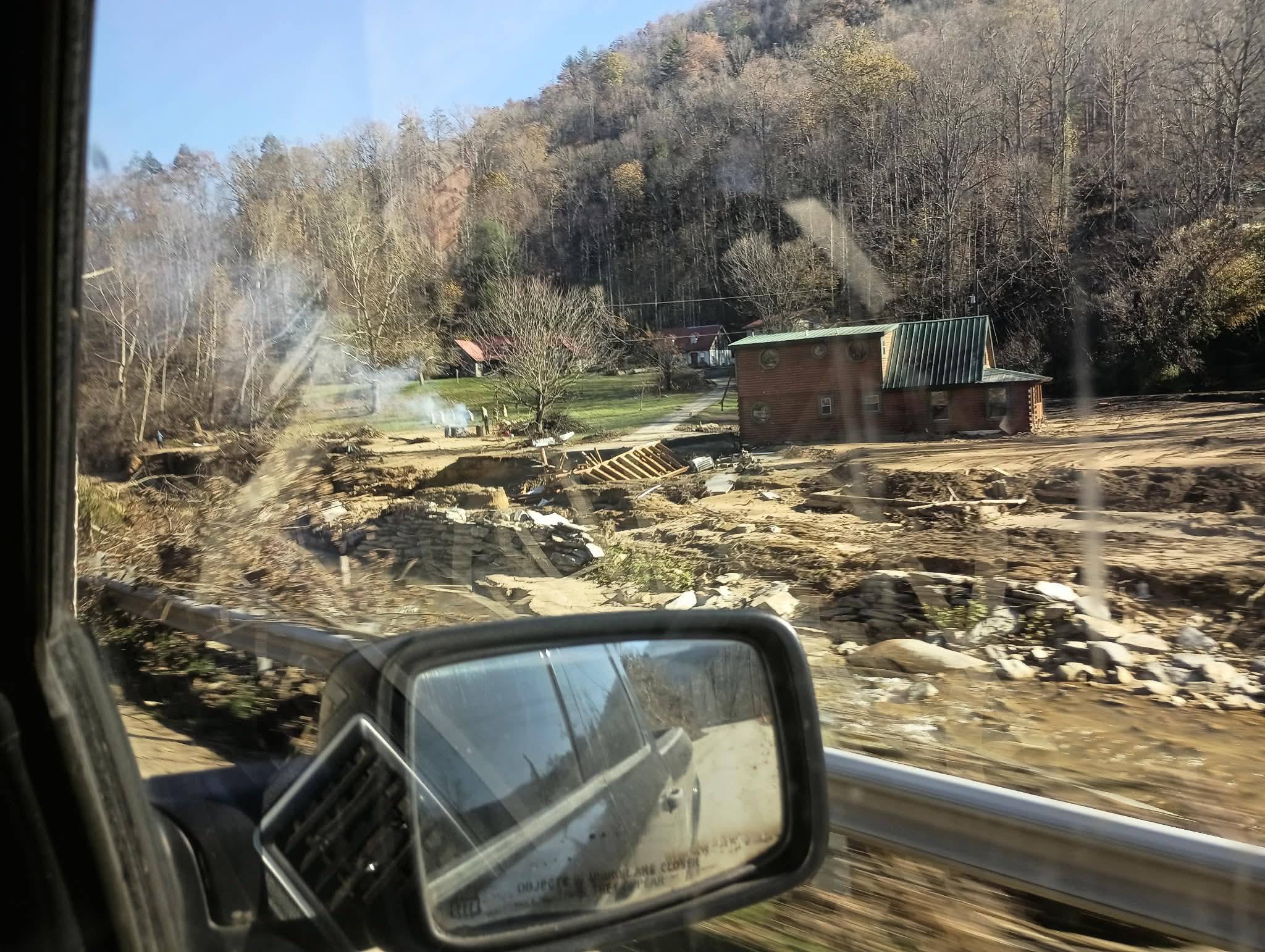 Flood damage around homes and washed out ground during disaster relief work